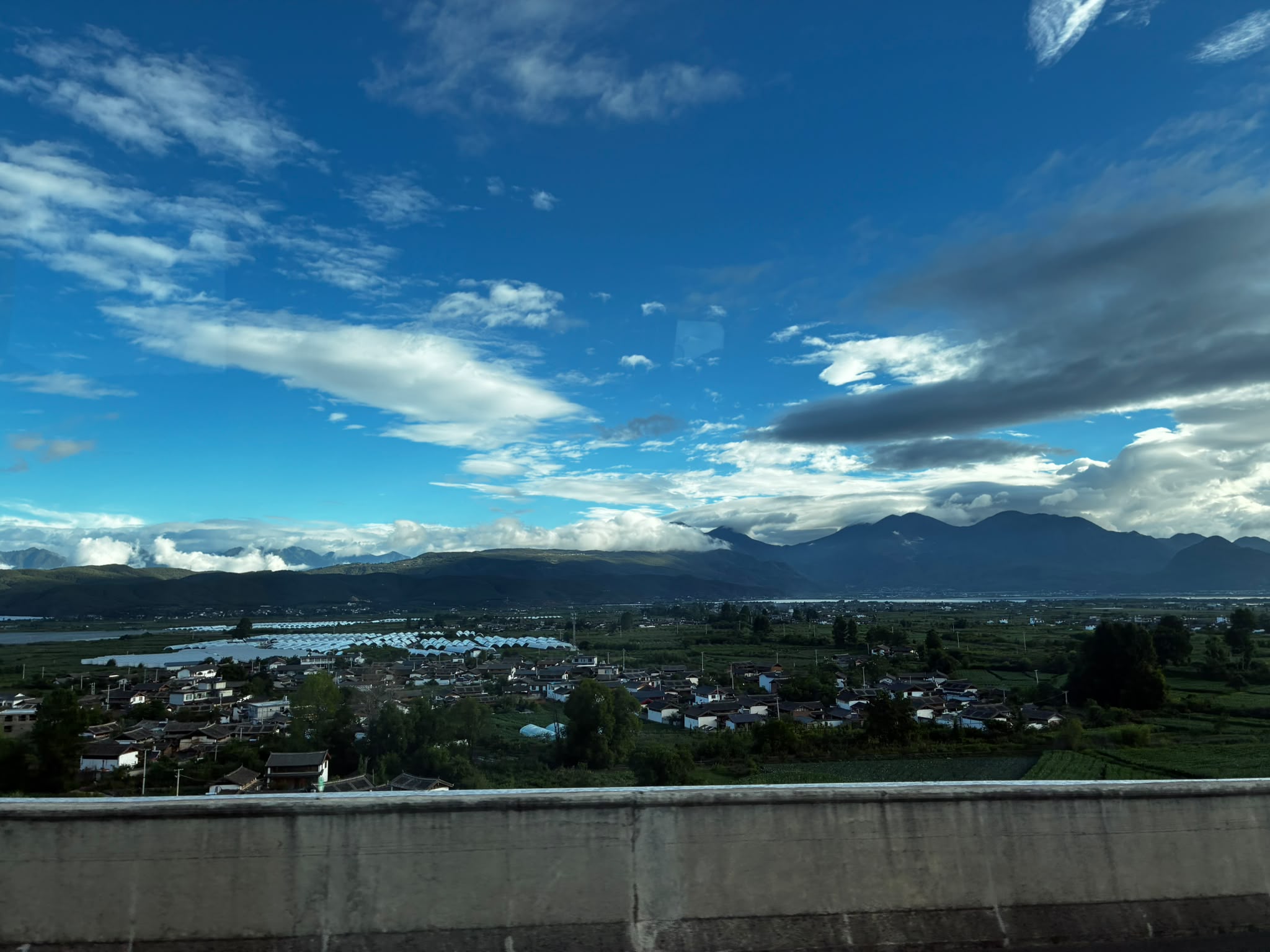 Mountain valley and dramatic blue sky photographed by Low Cheng Jun